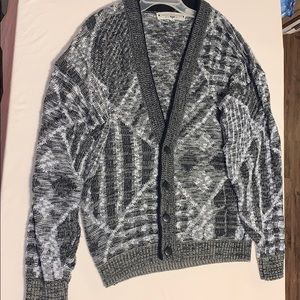 Cardigan. Can button or unbutton.